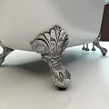 Elegant White Freestanding Bathtub With Ornate Metal Feet And Silver Faucet