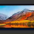 Blue Modern Laptop With Sleek Design Screen Displaying Scenic Mountains Lake And Trees