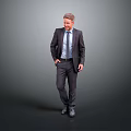 Man In Formal Suit And Tie Standing Confidently Against Gray Background