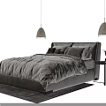 Modern Double Bed With Gray Quilt Pillows Dark Headboard And Pendant Lights