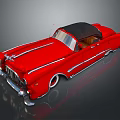 Red Vintage Convertible Car With Black Soft Top And Silver Accents