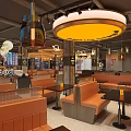 Modern Stylish Restaurant Interior With Circular Ceiling Lights Neon Decor And Comfortable Booth Seats