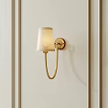Elegant Golden Wall Lamp Mounted On Vertical Paneled Light Beige Wall With White Lampshade