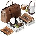 Brown Leather Bag With Stacked Books Table Lamp Coffee Cup And Green Apples
