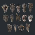 Various Intricate Shield Designs With Decorative Patterns And Unique Shapes