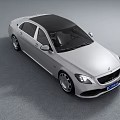 Silver Luxury Sedan With Black Roof Modern Design And Elegant Front Styling