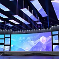 Future Themed Stage Design With Large Screen Pink Blue Lighting And Backdrop
