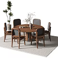 Round Wooden Dining Table Set with Matching Chairs Plant Vase on Light Rug
