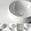 Modern White Ceramic Round Countertop Washbasin with Smooth Surface and Minimalist Design