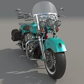 Classic Turquoise Motorcycle With Windshield Black Seat Chrome Details And Saddlebags