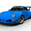 Blue Wide Body Sports Car With Rear Wing And Shiny Alloy Wheels