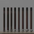 Various Dark Brown Wooden Columns With Different Carved Patterns And Gray Bases 3d model