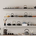 Assorted Tea Sets Collection Featuring Teapots and Teacups on Tiered Shelves