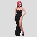 Woman with red hair wearing black strapless long dress with slit and black high heels