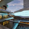 Modern Commercial Plaza With Sculpture Open Space Pedestrians And Tall Building