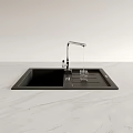 Modern Kitchen Faucet With Water Flowing Into Glass On Black Sink And Marble Countertop