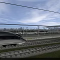 Aerodynamic High Speed Train Running On Rail Tracks With Station And Blue Sky