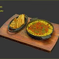 Yellow Rice Dish With Red Seasoning And Potato Strips On Wooden Tray Black Pots