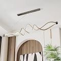 Modern Curved Chandelier in Contemporary Interior with Arched Wooden Door and Potted Plant