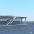 Modern Building Featuring Large Glass Windows Sloped Entrance Lamp Posts And Road