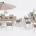 Outdoor Wooden Table And Rattan Chairs Set With Beige Umbrella And Decorative Vases