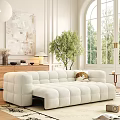 White Plush Sectional Sofa With Modular Design Wooden Cabinet Table Lamp And Green Plant