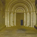 Arched Entrance Gate with Stone Walls Stone Columns Wooden Door and Slab Floor