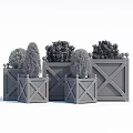 Colorful Square Garden Planters With Green Shrubs And Decorative Top Balls