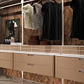 Modern Walk in Closet Interior with Open Hanging Area Drawers and Marble Countertop