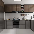 Modern Kitchen With Brown Gray Cabinets Stainless Steel Refrigerator And White Countertop
