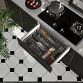 Organized Kitchen Utensils In Open Drawer With Green Cabinets And Black White Tile Floor
