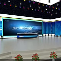Modern Conference Stage Setup With Large Screens Colorful Lights And Red Seats