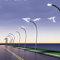Row of Modern Curved Outdoor Lights Illuminating Roadside By Waterfront With Grass