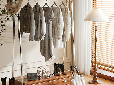 Metal Clothes Rack with Hanging Clothes Shoes and Bags in Cozy Indoor Setting 3d model