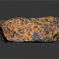 Wood Stone Material Block With Orange Black Porous Surface And Natural Texture