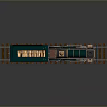 Vintage Steam Train Model With Green Locomotive And Yellow Cargo Car On Tracks