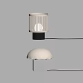 Modern Table Lamps Featuring Striped And Scalloped Shades With Black White Bases Illuminated