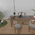 Chinese Wooden Tea Table With Round Cushioned Stools And Green Moss Plants