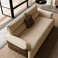 Modern Living Room Sofa Set With Beige Brown Couches Coffee Table Artwork And Natural Light