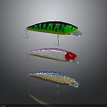 Three Different Colored Fishing Lures With Striped Patterns And Metal Hooks