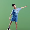 Short Sleeved Blue Sports Uniform With Winner Team Text On Green Background For Young Athletes