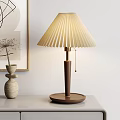 Pleated Lampshade Wooden Table Lamp With Round Base Vase And Artwork In Interior
