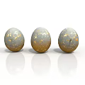 Three Decorative Egg Shaped Sculptures with Gold Specks and Blue Gray Texture