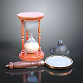 Vintage Desk Setup With Wooden Hourglass Brass Bell And Magnifying Glass