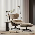 Modern Leisure Chair with Ottoman Side Table Green Plant and Floor Lamp on Rug