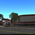 Red Brick School Building With Curved Design And Large Glass Windows Featuring Students On Campus