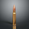 Isolated Shiny Metallic Bullet With Golden Casing And Copper Tip On Dark Background