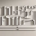 Different Types of White Plumbing Pipes And Fittings Arranged On Light Background