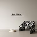 Stylish Black And White Checkered Accent Chair With Books Near Minimalist Wall