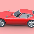 Red Classic Sports Car With Sleek Body Design And Silver Alloy Wheels